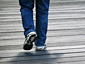 A Person The Skip Walking Away